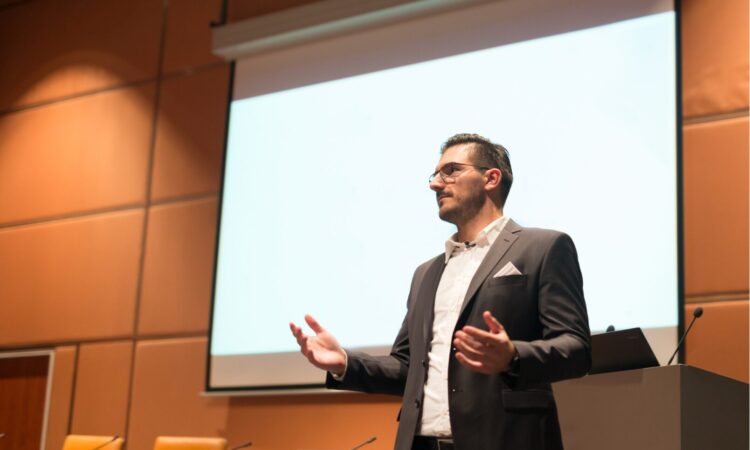 man presenting during a meeting